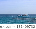 Tranquil ocean scene with sailboat in open sea as summer vacation inspiration 131409732