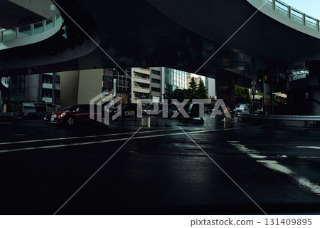 Pedestrian bridge and cars running in the city Pedestrian bridge and cars running in the city 131409895