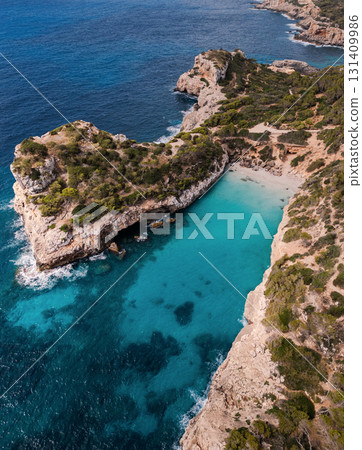 Turquoise bay surrounded by 131409986