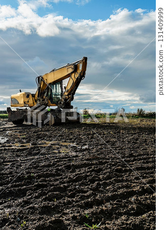 Excavator on muddy Excavator on muddy 131409999