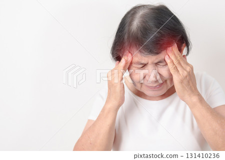 Elderly Woman having headache and Dizzy for concepts of Chronic Stress, Headache and Migraine, World Brain Tumor day, Brain Cancer, Brain Stroke, Dementia, alzheimer, Hypotension and mental health Elderly Woman having headache and Dizzy for concepts of Chronic Stress, Headache and Migraine, World Brain Tumor day, Brain Cancer, Brain Stroke, Dementia, alzheimer, Hypotension and mental health 131410236