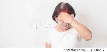 Elderly Woman having headache and Dizzy for concepts of Chronic Stress, Headache and Migraine, World Brain Tumor day, Brain Cancer, Brain Stroke, Dementia, alzheimer, Hypotension and mental health Elderly Woman having headache and Dizzy for concepts of Chronic Stress, Headache and Migraine, World Brain Tumor day, Brain Cancer, Brain Stroke, Dementia, alzheimer, Hypotension and mental health 131410237