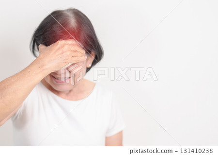 Elderly Woman having headache and Dizzy for concepts of Chronic Stress, Headache and Migraine, World Brain Tumor day, Brain Cancer, Brain Stroke, Dementia, alzheimer, Hypotension and mental health Elderly Woman having headache and Dizzy for concepts of Chronic Stress, Headache and Migraine, World Brain Tumor day, Brain Cancer, Brain Stroke, Dementia, alzheimer, Hypotension and mental health 131410238