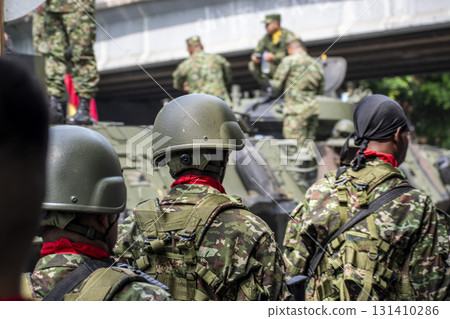 Colombian army preparing for battle, Soldiers getting ready for combat, Armed forces in military readiness Colombian army preparing for battle, Soldiers getting ready for combat, Armed forces in military readiness 131410286