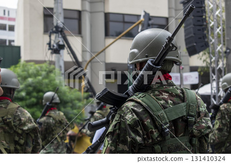 Soldiers in the streets, Armed military in urban area, Armed forces in control operation Soldiers in the streets, Armed military in urban area, Armed forces in control operation 131410324