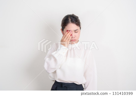 Business Woman having Eye pain and Irritation for concepts of Eye disease, Cataract, Glaucoma, Age Related Macular Degeneration, Diabetic Retinopathy, dry eyes, Conjunctivitis, World Glaucoma day Business Woman having Eye pain and Irritation for concepts of Eye disease, Cataract, Glaucoma, Age Related Macular Degeneration, Diabetic Retinopathy, dry eyes, Conjunctivitis, World Glaucoma day 131410399