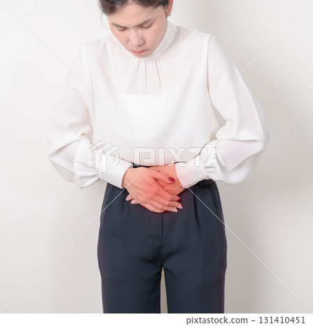 Business woman having Colon pain for Colonic disease, Inflammatory Bowel, IBD, Colorectal cancer, Ulcerative colitis, Diverticulitis, Irritable bowel syndrome, Digestive system and Health concept 131410451