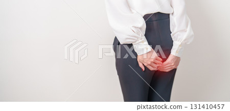 Business Woman having Anal symptoms pain for Hemorrhoids disease, Constipation, Anal cancer awareness month, diarrhea, Irritable Bowel Syndrome, IBS, Inflammation, Colorectal cancer and Anal Procttis 131410457