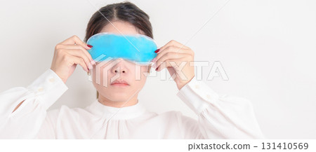 Business Woman with cold Eye Mask for concepts of Eye disease, Dry, Pain and Irritation eyes, Cataract, Glaucoma, Age Related Macular Degeneration, Conjunctivitis, World Glaucoma day and health Business Woman with cold Eye Mask for concepts of Eye disease, Dry, Pain and Irritation eyes, Cataract, Glaucoma, Age Related Macular Degeneration, Conjunctivitis, World Glaucoma day and health 131410569