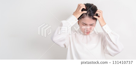 Business woman having itchy Scalp and Head hair, Dandruff, Dry Scalp, Skin Allergy Seborrheic dermatitis. Dermatology, Leprosy day, Systemic lupus erythematosus, SLE, Psoriasis and Atopic Eczema rash Business woman having itchy Scalp and Head hair, Dandruff, Dry Scalp, Skin Allergy Seborrheic dermatitis. Dermatology, Leprosy day, Systemic lupus erythematosus, SLE, Psoriasis and Atopic Eczema rash 131410737
