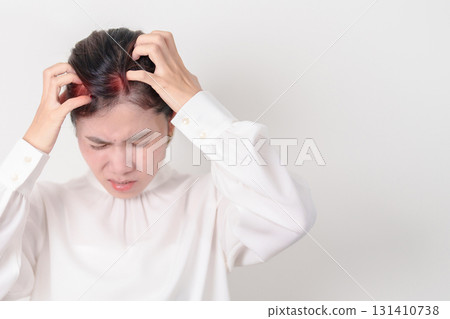Business woman having itchy Scalp and Head hair, Dandruff, Dry Scalp, Skin Allergy Seborrheic dermatitis. Dermatology, Leprosy day, Systemic lupus erythematosus, SLE, Psoriasis and Atopic Eczema rash Business woman having itchy Scalp and Head hair, Dandruff, Dry Scalp, Skin Allergy Seborrheic dermatitis. Dermatology, Leprosy day, Systemic lupus erythematosus, SLE, Psoriasis and Atopic Eczema rash 131410738