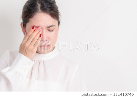Business Woman having Eye pain and Irritation for concepts of Eye disease, Cataract, Glaucoma, Age Related Macular Degeneration, Diabetic Retinopathy, dry eyes, Conjunctivitis, World Glaucoma day Business Woman having Eye pain and Irritation for concepts of Eye disease, Cataract, Glaucoma, Age Related Macular Degeneration, Diabetic Retinopathy, dry eyes, Conjunctivitis, World Glaucoma day 131410740