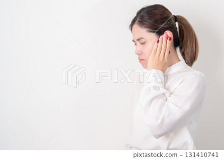 Business Woman having Ear pain for concept of Ear disease, Atresia, Otitis Media, Infection, Pertorated Eardrum, Meniere syndrome, Otolaryngologist, Hearing Loss, Hyperacusis, Tinnitus and Earwax Business Woman having Ear pain for concept of Ear disease, Atresia, Otitis Media, Infection, Pertorated Eardrum, Meniere syndrome, Otolaryngologist, Hearing Loss, Hyperacusis, Tinnitus and Earwax 131410741