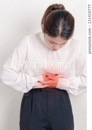 Business woman having abdomen aches for Stomach pain, digestion with constipation or Diarrhea from food poisoning, female problem and Endometriosis, Hysterectomy, Stomachache and Menstrual concept 131410777