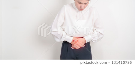 Business woman having Colon pain for Colonic disease, Inflammatory Bowel, IBD, Colorectal cancer, Ulcerative colitis, Diverticulitis, Irritable bowel syndrome, Digestive system and Health concept 131410786