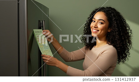 Happy woman shows her schedule, planning week for success. Great planning Happy woman shows her schedule, planning week for success. Great planning 131412937