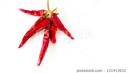 White background and multiple red chili peppers 131413632
