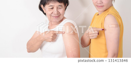 Adult and Elderly Woman with bandage after received vaccine. Vaccination and Immunization for Influenza, HPV, Zoster, IPD, DTP, Dengue, Encephalitis, Rabies, Pneumococcal Hepatitis B and Covid vaccine Adult and Elderly Woman with bandage after received vaccine. Vaccination and Immunization for Influenza, HPV, Zoster, IPD, DTP, Dengue, Encephalitis, Rabies, Pneumococcal Hepatitis B and Covid vaccine 131413846