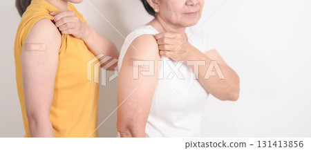 Adult and Elderly Woman with bandage after received vaccine. Vaccination and Immunization for Influenza, HPV, Zoster, IPD, DTP, Dengue, Encephalitis, Rabies, Pneumococcal Hepatitis B and Covid vaccine Adult and Elderly Woman with bandage after received vaccine. Vaccination and Immunization for Influenza, HPV, Zoster, IPD, DTP, Dengue, Encephalitis, Rabies, Pneumococcal Hepatitis B and Covid vaccine 131413856
