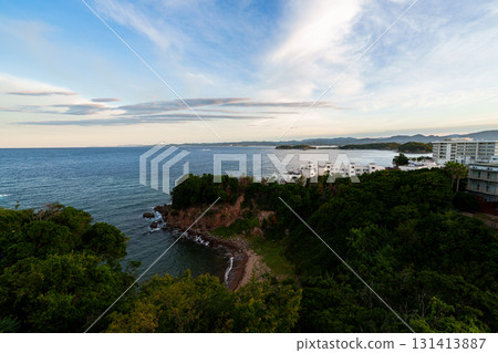 The sky and sea of Nanki Shirahama at dawn. The morning glow lingers on the horizon and the shining sea of Shirahama. The sky and sea of Nanki Shirahama at dawn. The morning glow lingers on the horizon and the shining sea of Shirahama. 131413887