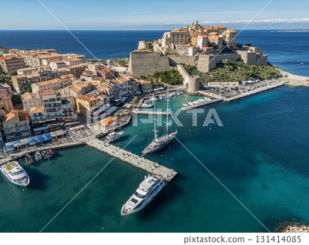 Aerial view Citadel of Calvi Upper Corsica French maritime stronghold in the Mediterranean Sea with defensive walls Aerial view Citadel of Calvi Upper Corsica French maritime stronghold in the Mediterranean Sea with defensive walls 131414085