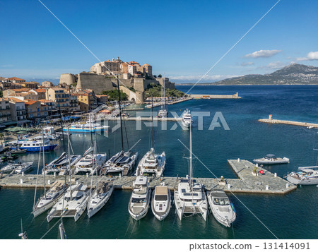 Aerial view Citadel of Calvi Upper Corsica French maritime stronghold in the Mediterranean Sea with defensive walls Aerial view Citadel of Calvi Upper Corsica French maritime stronghold in the Mediterranean Sea with defensive walls 131414091