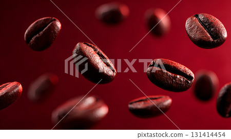 Floating coffee beans artfully arranged on a vibrant red backdrop, creating a visual delight 131414454