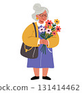 Happy senior woman holding flowers for special occasion, happy grandma smiles 131414462
