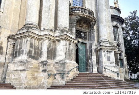 Historic baroque church and cathedral dome in central Lviv, Ukraine. Ancient architecture and religious landmark on Market Square 131417019