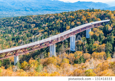 Matsumi Bridge dyed in autumn leaves at Mikuni Pass in Hokkaido Matsumi Bridge dyed in autumn leaves at Mikuni Pass in Hokkaido 131418333