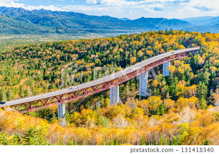 Matsumi Bridge dyed in autumn leaves at Mikuni Pass in Hokkaido Matsumi Bridge dyed in autumn leaves at Mikuni Pass in Hokkaido 131418340