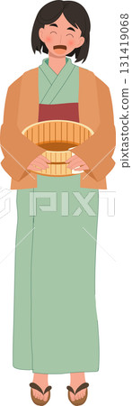 japanese woman in yukata holding wooden bucket after onsen bath at japanese hot spring spa japanese woman in yukata holding wooden bucket after onsen bath at japanese hot spring spa 131419068