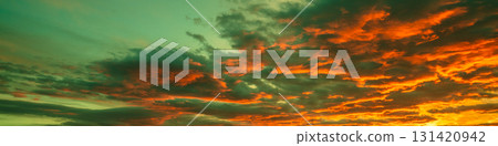 Colorful dramatic cloudy sky at sunset. Gradient color. Sky texture, abstract nature background. Horizontal banner 131420942