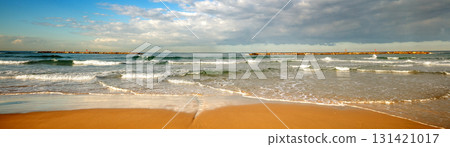 Seascape on a sunny day with a beautiful cloudy sky Seascape on a sunny day with a beautiful cloudy sky 131421017