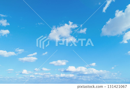 Blue cloudy sky on a sunny day.  Sky texture. Abstract nature background 131421067