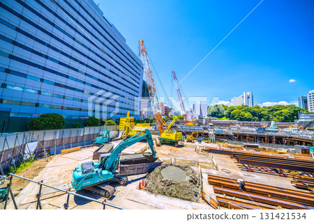 Tokyo cityscape in Japan. Overlooking the redevelopment work in front of Shinagawa Station. Large heavy machinery such as crawler cranes are lined up... (26th) 131421534