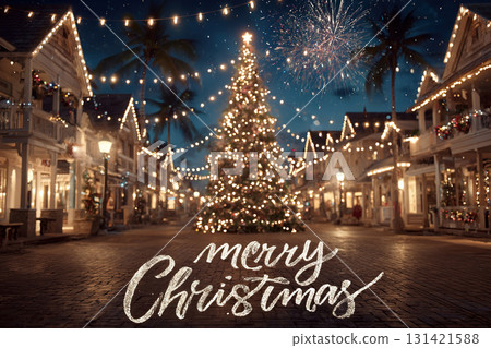 A Christmas tree stands on the street next to houses and palm trees. Festive fireworks display against the backdrop of the tree and palm trees. A white sign reads Merry Christmas. 131421588