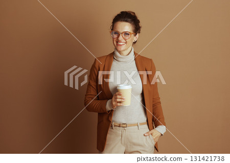 Smiling Businesswoman with Coffee Cup and Glasses 131421738