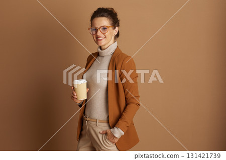 Smiling Professional with Coffee and Glasses 131421739