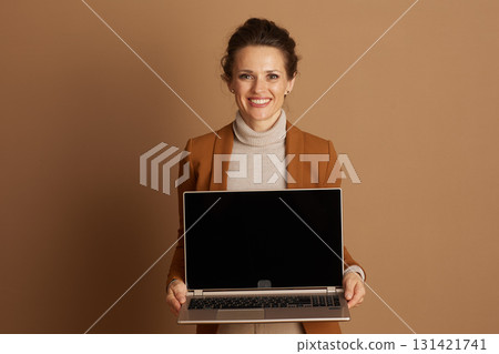 Friendly Professional with Open Laptop Screen Friendly Professional with Open Laptop Screen 131421741