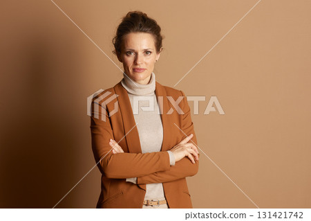 Authoritative Businesswoman in Brown Blazer 131421742