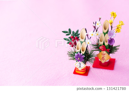 New Year's pine decoration on a pink background 131421780
