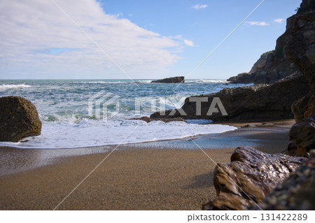 Rocky ocean coast with sandy beach Rocky ocean coast with sandy beach 131422289