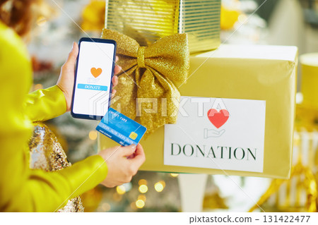 Online Holiday Donation with Smartphone and Gift Box Online Holiday Donation with Smartphone and Gift Box 131422477