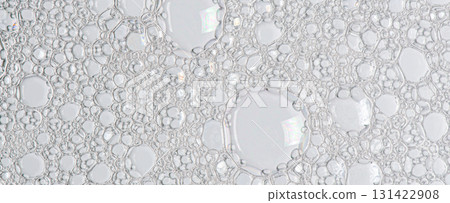 The texture of the foam of shower gel or soap suds. Macrophotography 131422908