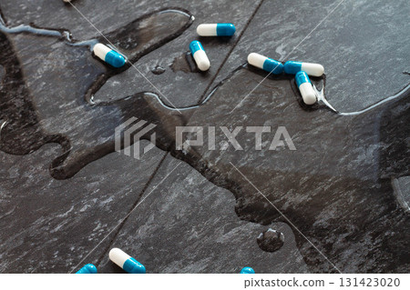 Tablets. Dropping pills and a glass of water from the hands. Tablets. Dropping pills and a glass of water from the hands. 131423020