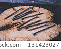 Fasteners for wood. Self-tapping screws on a wooden table. 131423027