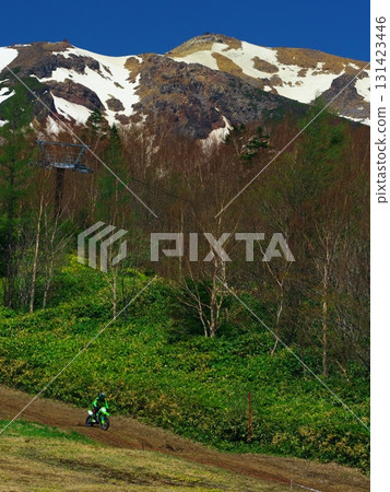 Off-road bikes racing through Ontake Explorer Park at Ontake Ski Resort 131423446