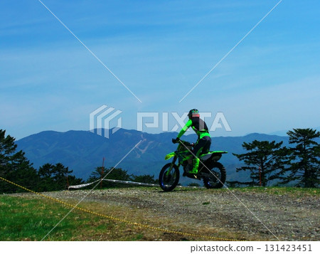Off-road bikes racing through Ontake Explorer Park at Ontake Ski Resort 131423451