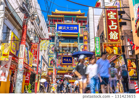 Yokohama cityscape in Japan: Yokohama Chinatown bustling with tourists. View of the popular fortune-telling shops along Guandi Temple Street. 131423655